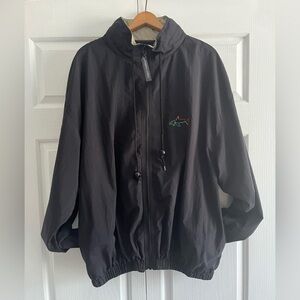 Greg Norman Collection Men’s Black Vented  Windbreaker.  Hood In Collar.